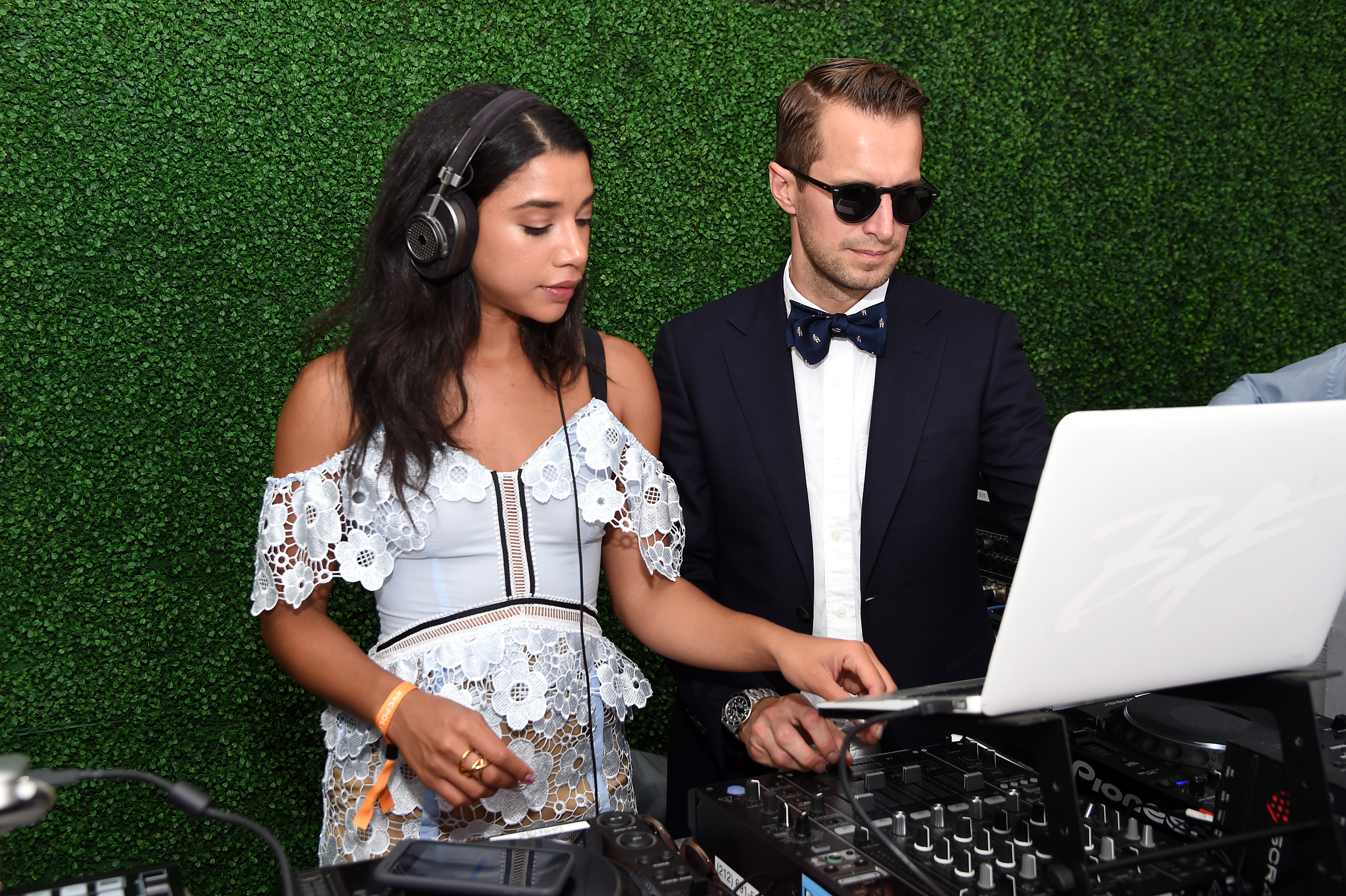 JERSEY CITY, NJ - JUNE 04:  Hannah Bronfman (L) and Brendan Fallis perform during the Ninth Annual Veuve Clicquot Polo Classic at Liberty State Park on June 4, 2016 in Jersey City, New Jersey.  (Photo by Jamie McCarthy/Getty Images for Veuve Clicquot)